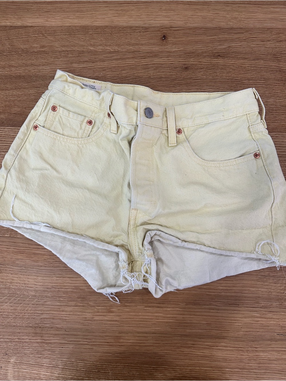 Levi's Yellow frayed jean Shorts size 29